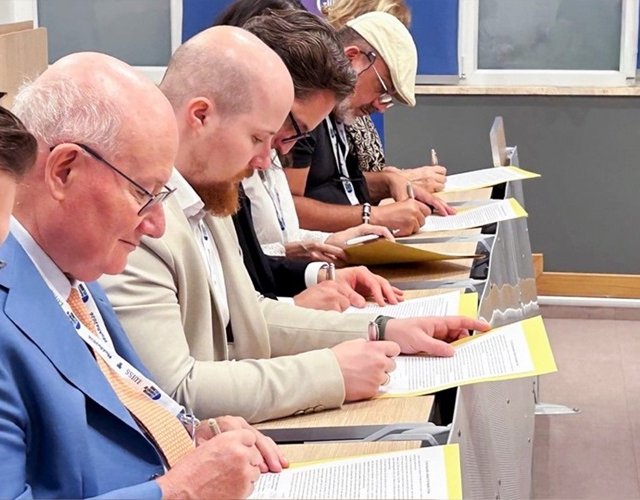 Religious-scholars-signing-an-appeal-requesting-an-end-to-Chairman-Lees-detention.jpg