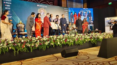 Victoria-Isaac-collects-her-citation-at-the-Dr.-K.C.G.-Verghese-Excellence-Awards-2026-in-Chennai.-The-screen-at-the-left-of-the-stage-carried-her-name-and-her-stage-name-Victoriastic.jpg