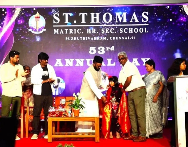 Victoria-Isaac-is-honoured-on-stage-at-the-53rd-Annual-Day-of-St.-Thomas-Matric-Hr.-Sec.-School-Puzhuthivakkam-Chennai.webp