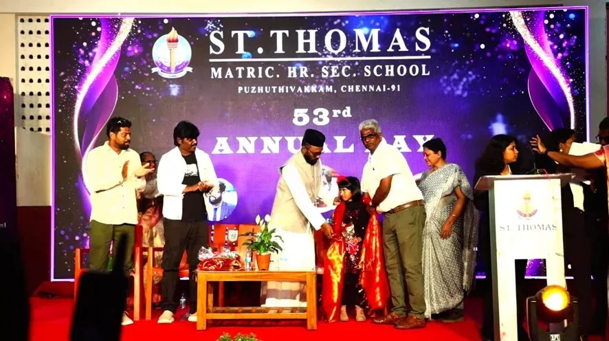 Victoria-Isaac-is-honoured-on-stage-at-the-53rd-Annual-Day-of-St.-Thomas-Matric-Hr.-Sec.-School-Puzhuthivakkam-Chennai.webp